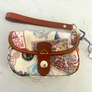 Dooney & Bourke Disney Parks Wristlet -Vintage Postcard Magic Kingdom Print- NWT